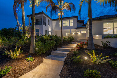 Beautiful two-story home with amazing pathway lighting and curb appeal lighting